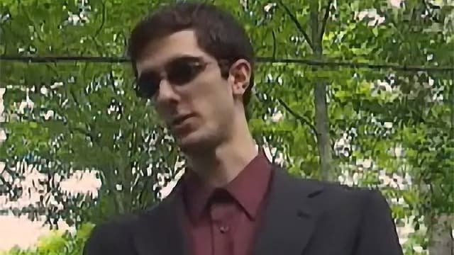 The Man in the Black Suit