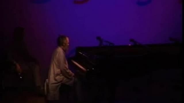 The Well-Tuned Piano in the Magenta Lights
